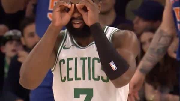 Jaylen Brown putting fake binoculars on